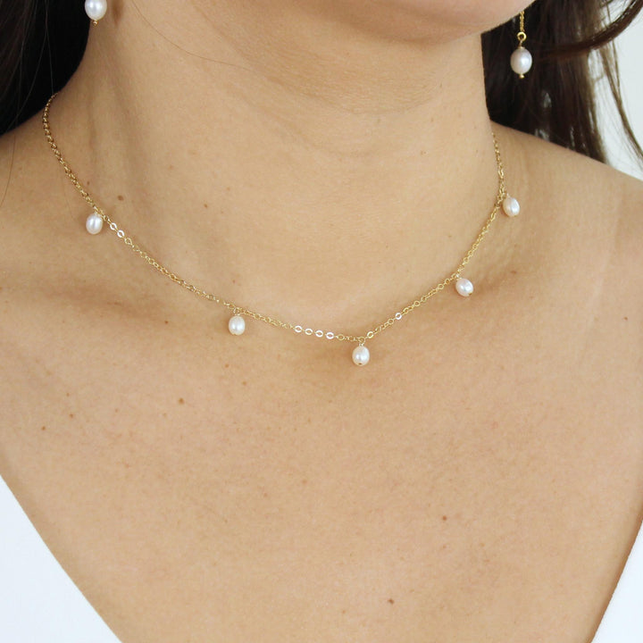 Calista Freshwater Pearl Drops Necklace in Gold Filled, showcasing delicate chain with five freshwater pearls.