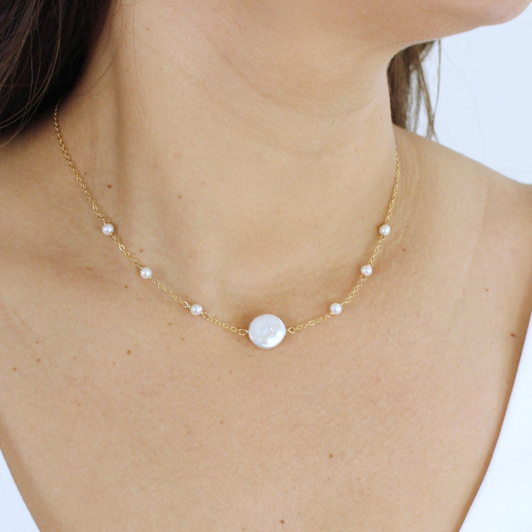 Elevate your style with the Sasha Coin Pearl Necklace. Perfect for layering or as a thoughtful gift for brides and bridesmaids. Shop Now!