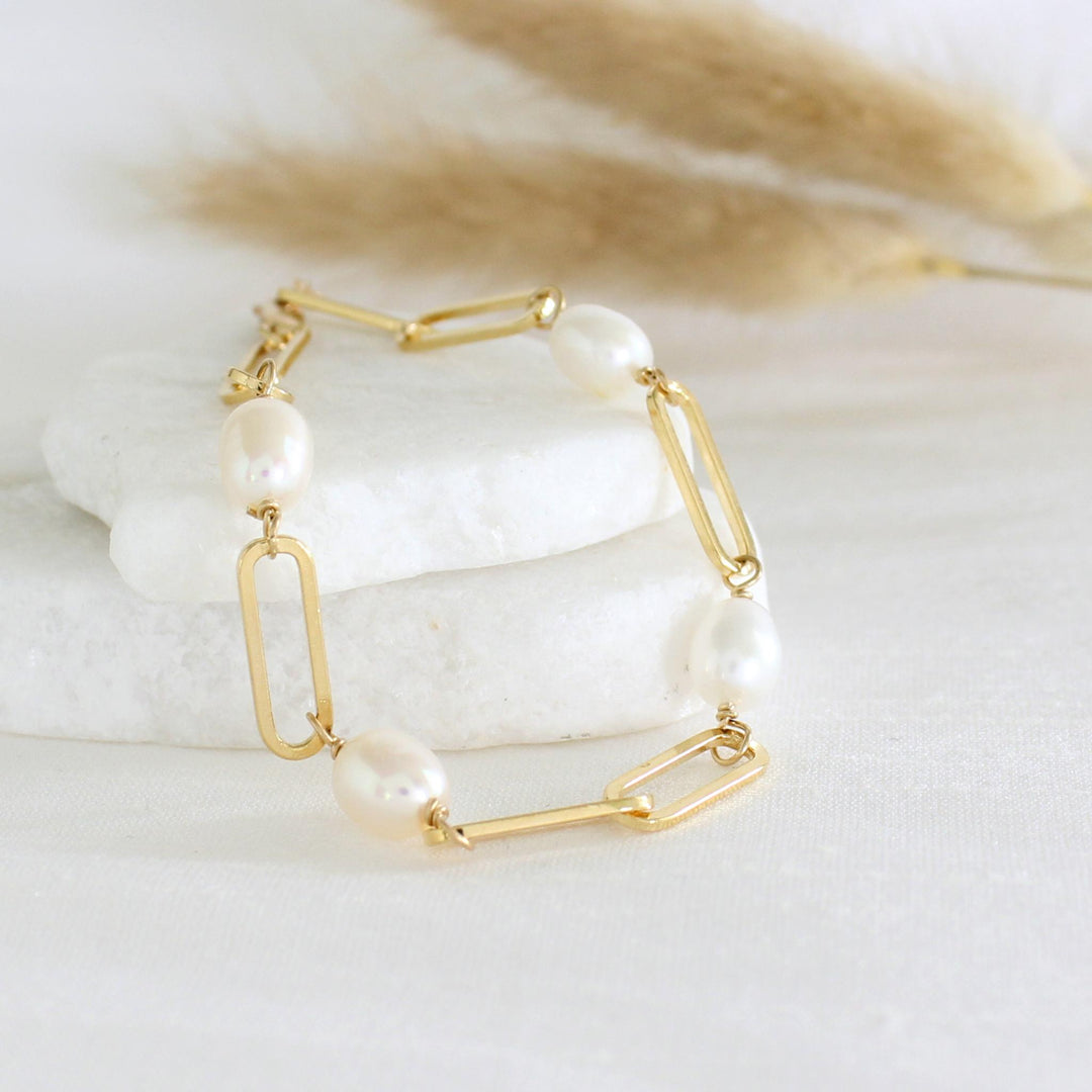 Celeste Paperclip Pearl Bracelet featuring freshwater pearls on a gold paperclip chain.