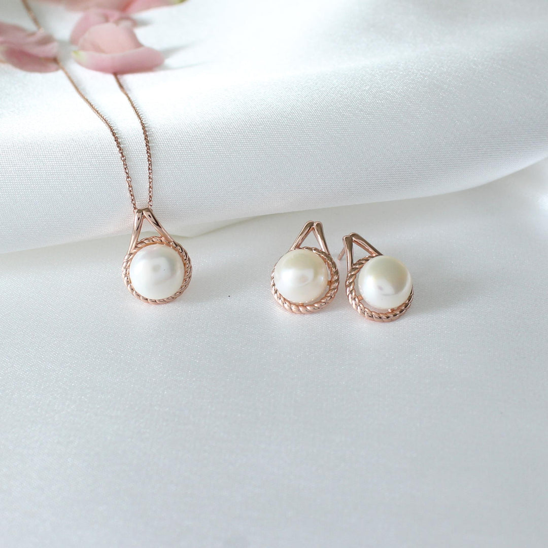 Shanell Rose Gold Twisted Pearl Set with freshwater pearls and twisted halo design in rose gold.