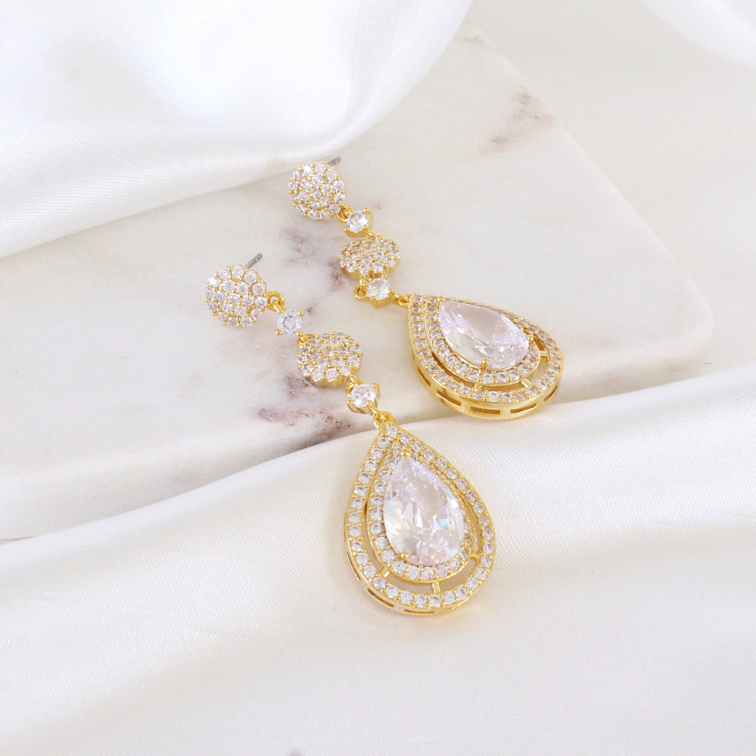 Sidney Gold Statement Drop Earrings with cubic zirconia crystal teardrops.